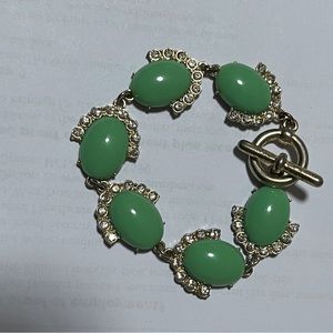 SELLING BRACELET FOR WOMEN  COLOR SILVER/GREEN /SIZE # REGULAR PRE-OWNED …..